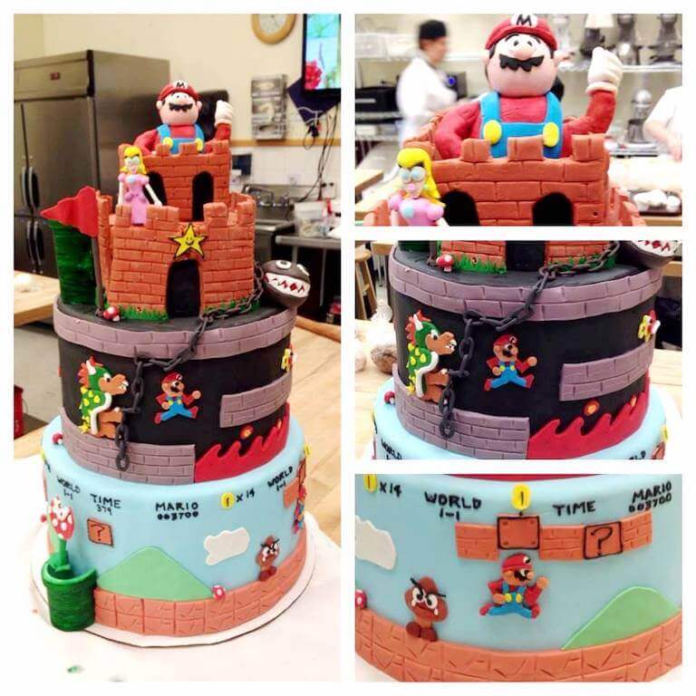 A three-tiered theme cake, showing scenes from the Nintendo game Super Mario Brothers.