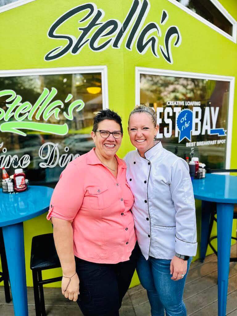 Morgan and Barbara Banno pose in front of Stella’s restaurant.