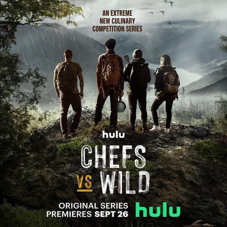 Advertisement for Hulu’s Chefs vs. Wild showing the backs of four people facing mountains in the rain.